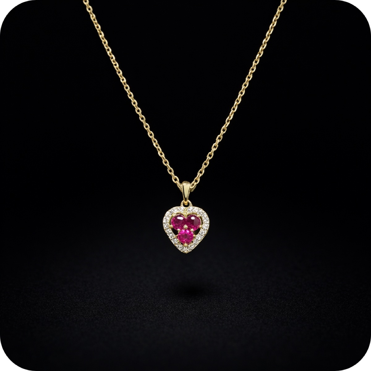 Dije de oro 14K con rubíes y diamantes naturales