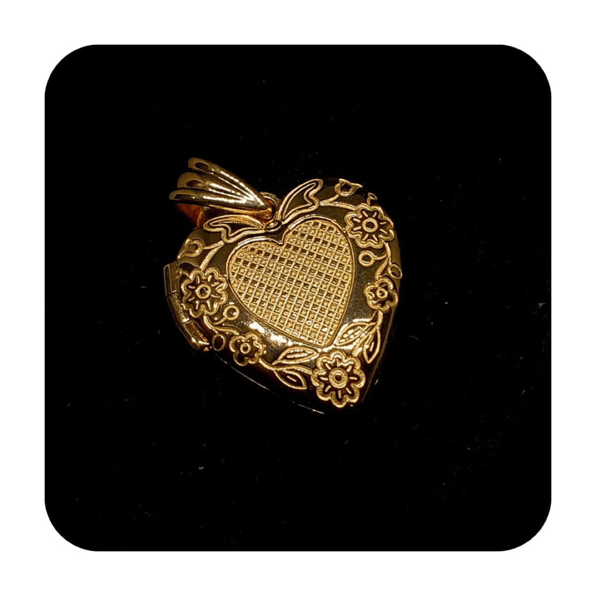 Relicario de corazón en oro 14K