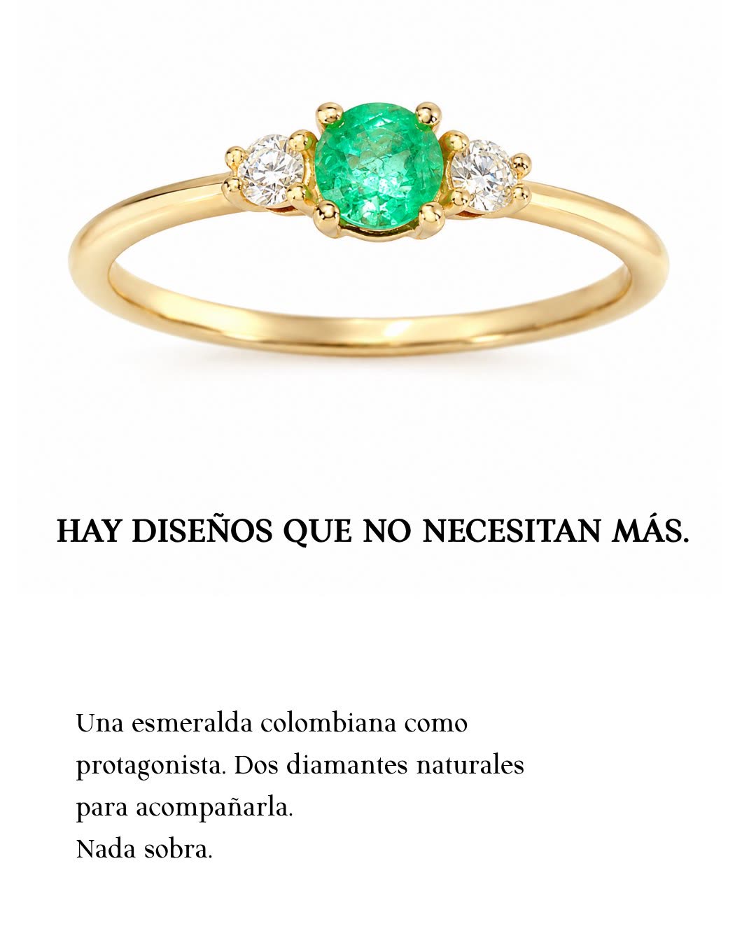 Anillo de esmeralda colombiana con dos diamantes en oro 14K